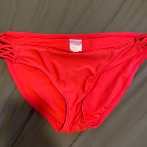 Coral bikini bottoms with side details